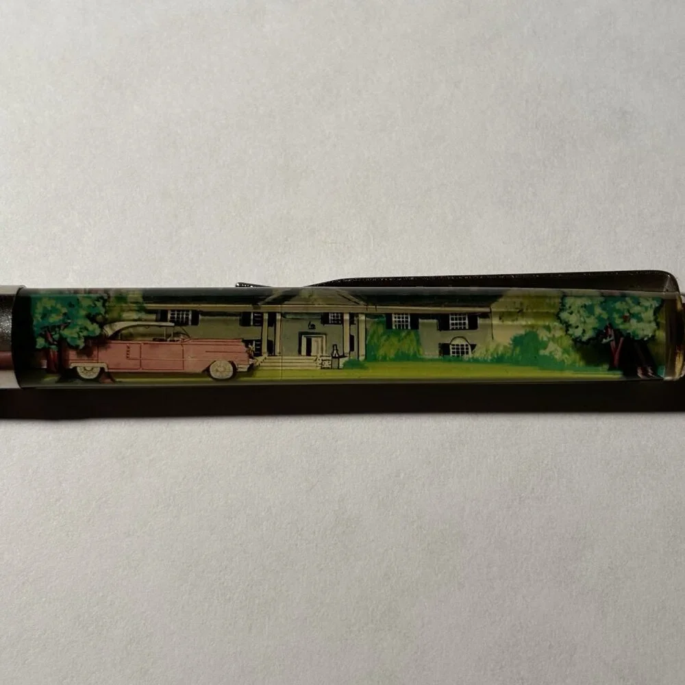 Graceland Floaty Pen Home of Elvis Presley Pink Cadillac Moves Souvenir Novelty